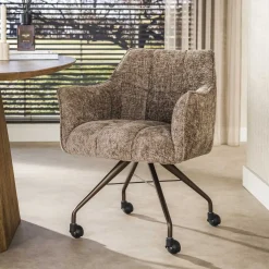 Kalfort Eetkamerstoelen|Kelly Eetkamerstoel met wieltjes Hoven champagne met bruin bronzen poot